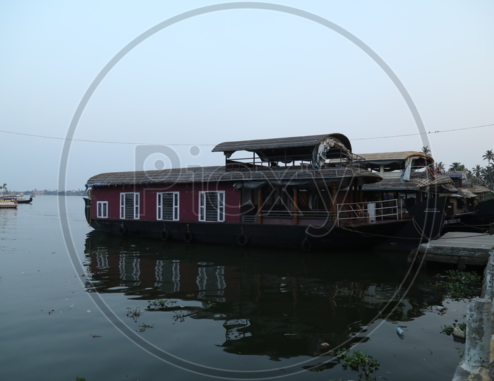 Boats rested in water in Kerala local lake