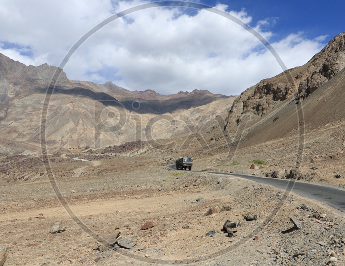Military van traveling on the roads of leh