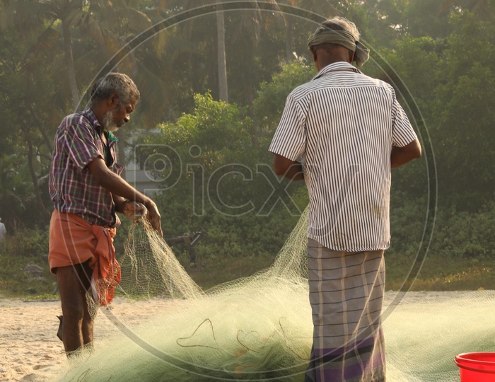 fishermen with fishing net