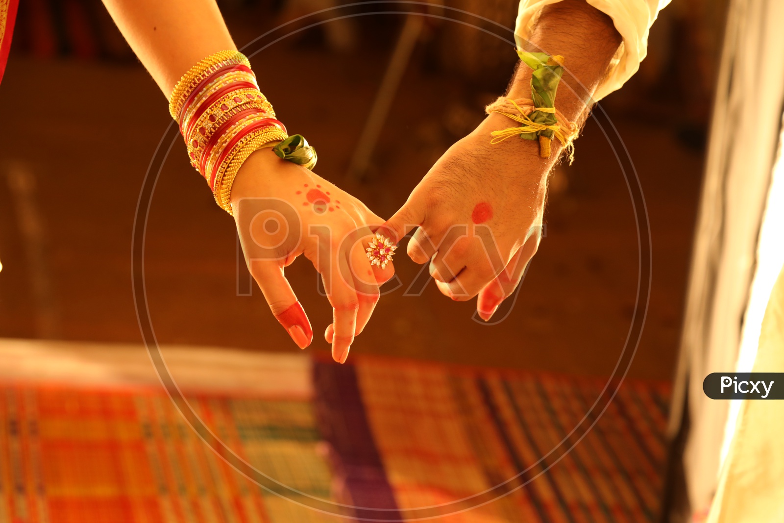 Wedding Couple holding  Hands in South Indian Weddings