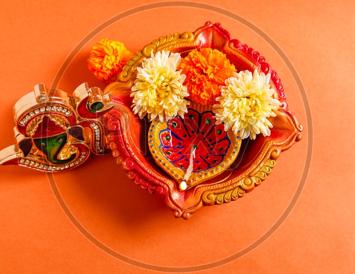 Indian Festival Diwali, Diwali Lamps, Deepavali Diyas with Flowers