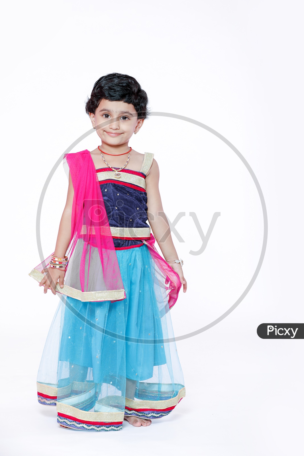 Indian Girl Child  on a Isolated White Background with a Smiling Face