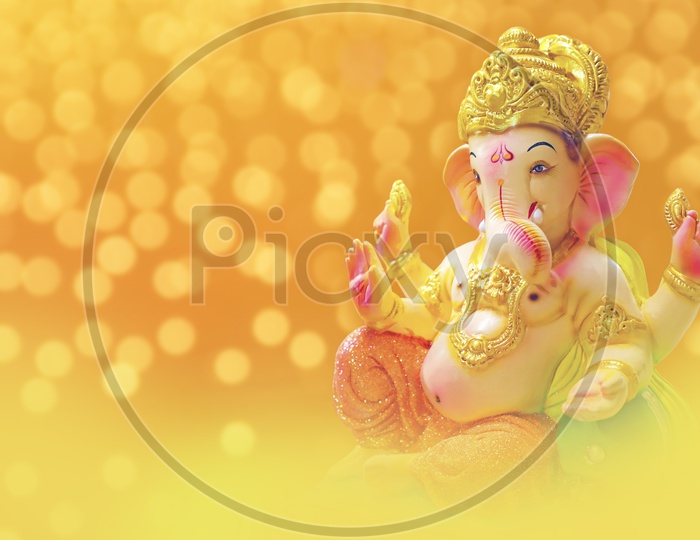 Lord Ganesh Idol with beautiful Bokeh background