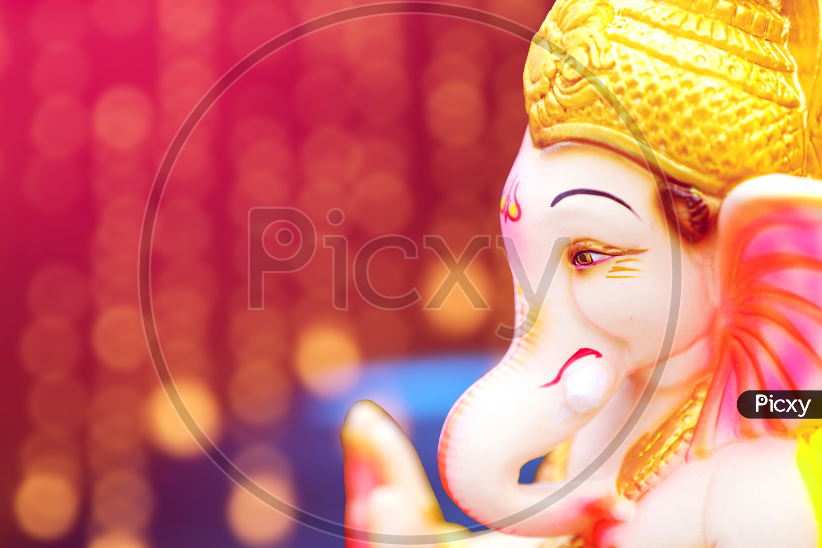 Lord Ganesha Idol with beautiful bokeh background / Ganesh Idol