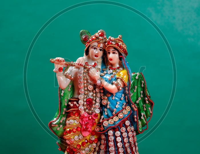 Radha Krishna Idol with green background