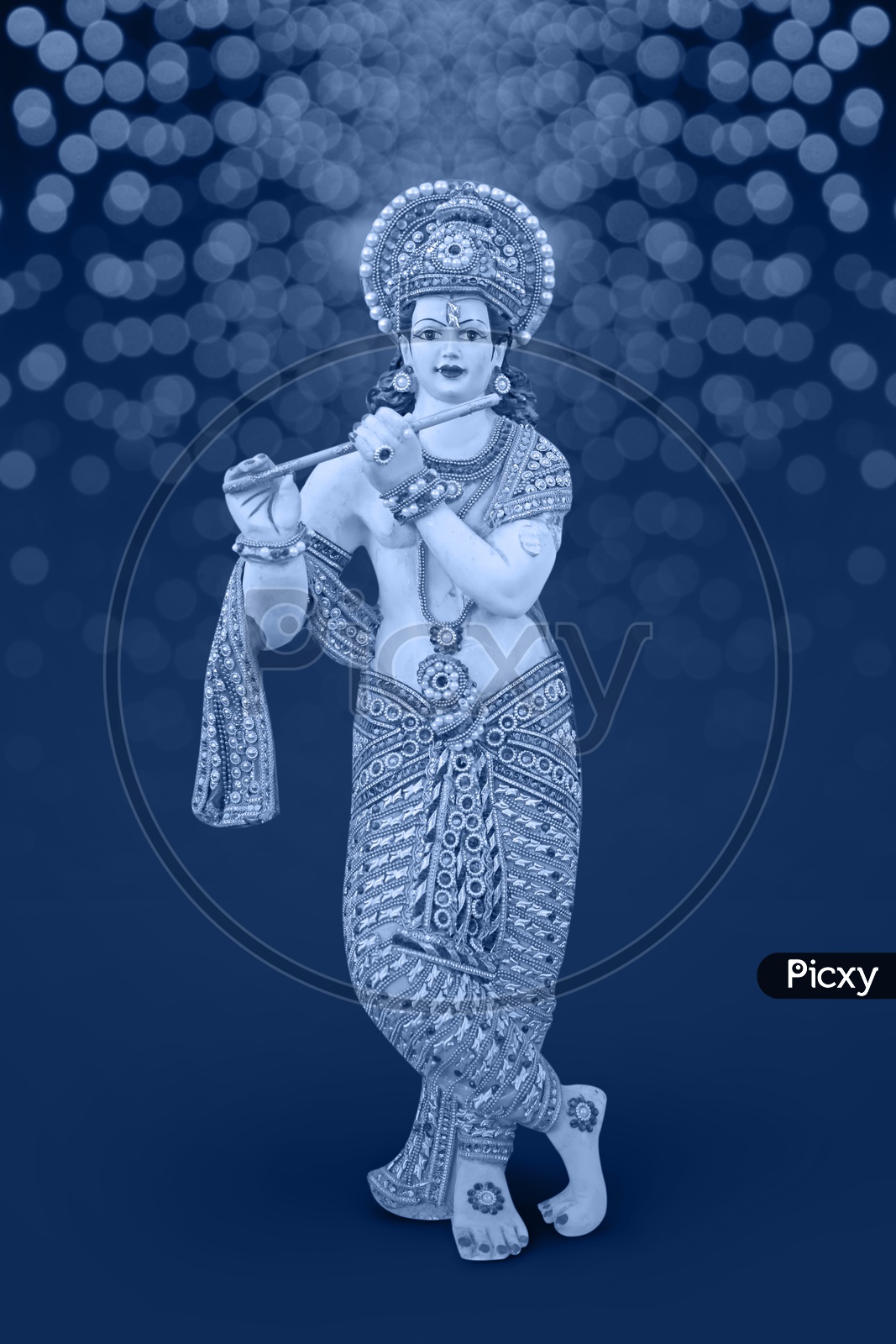 Lord Sri Krishna Idol with beautiful bokeh in the Background