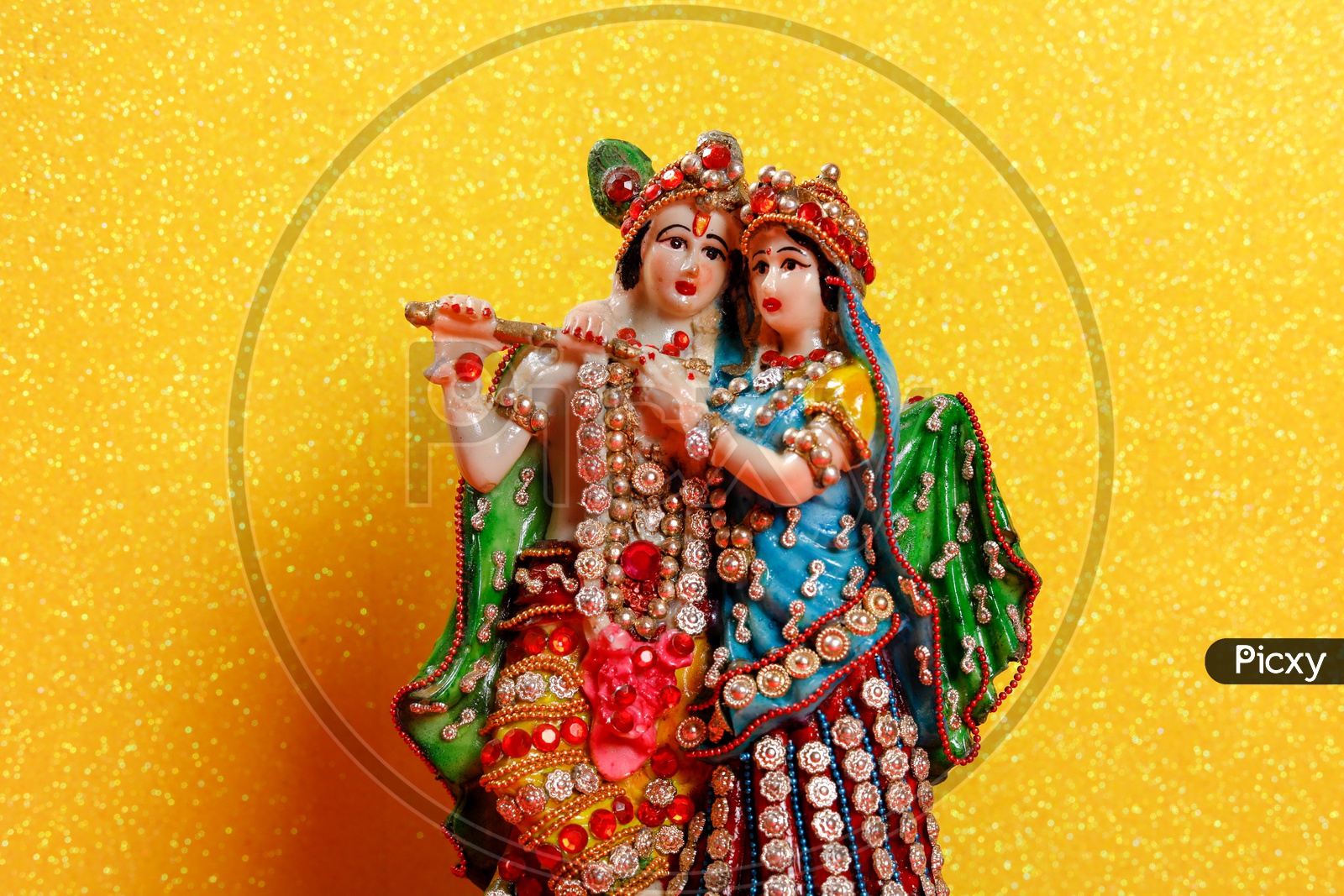Radha Krishna Idol and beautiful yellow background / Lord Sri Krishna Idol
