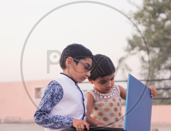 Indian Children Operating  Laptop Closeup Shot