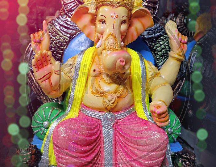 Lord Ganesha Idol with beautiful bokeh background