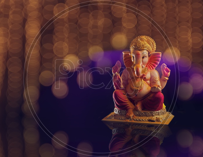 Lord Ganesha Idol with Beautiful Bokeh Background
