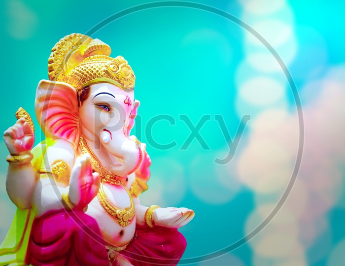 Lord Ganesh Idol with beautiful bokeh in the background