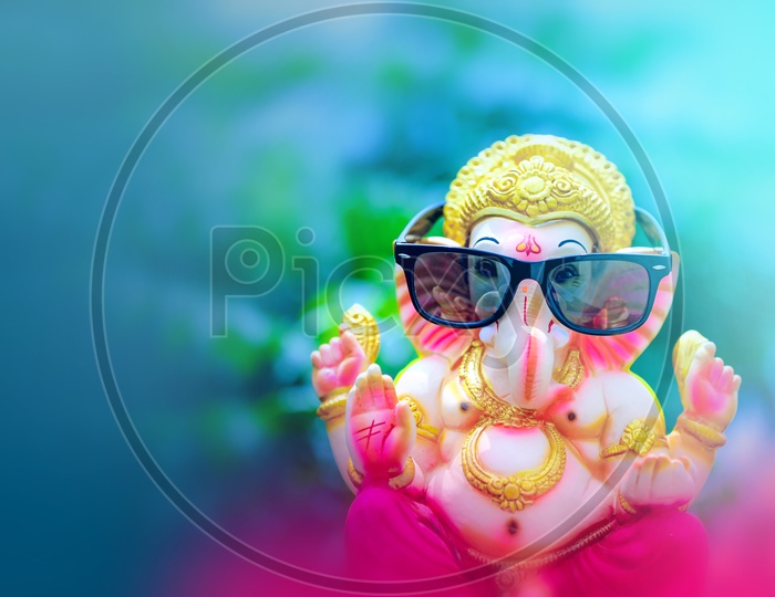 Lord Ganesh Idol with sun glasses goggles /  Ganesha Idol