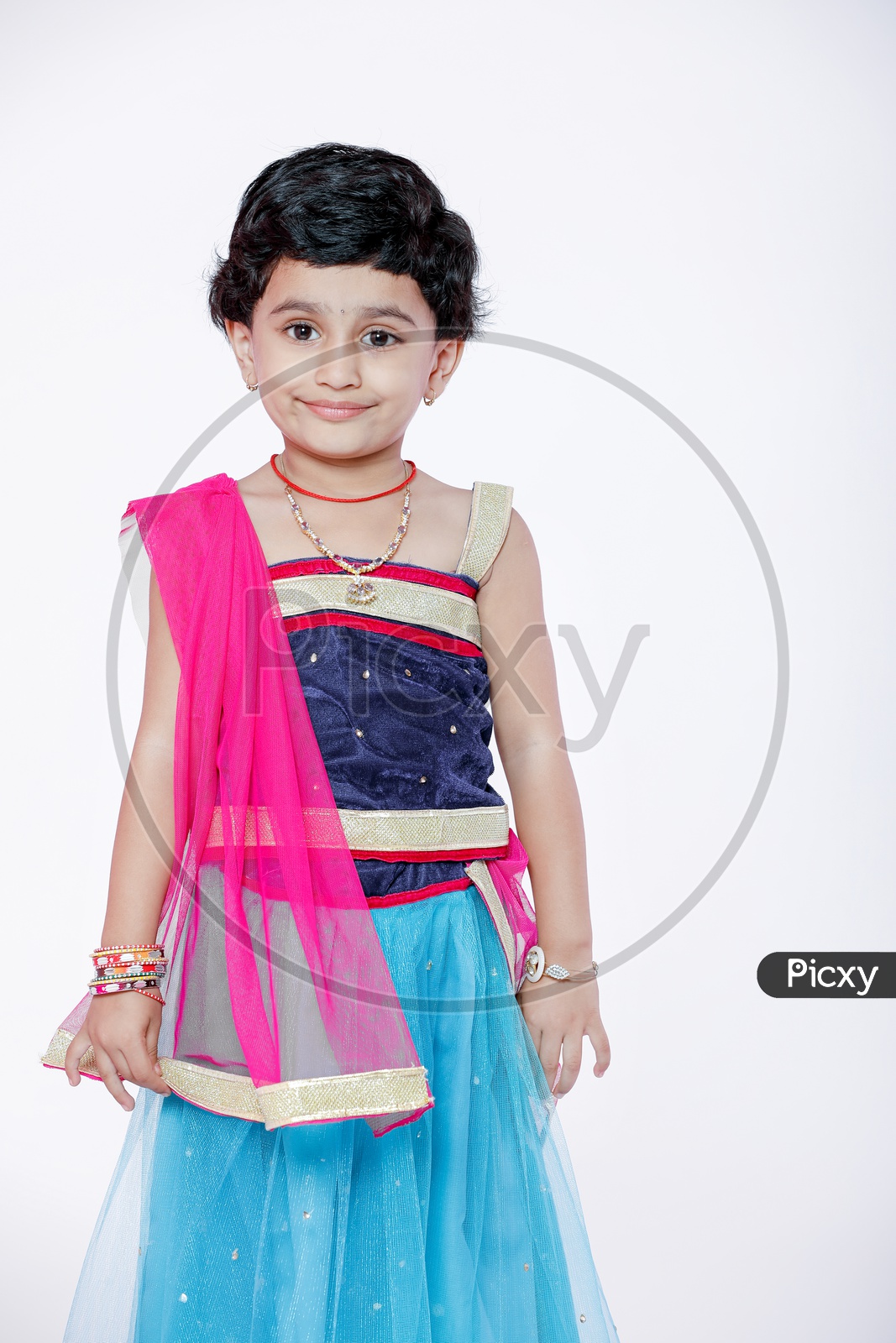 Indian Girl Child  on a Isolated White Background with a Smiling Face