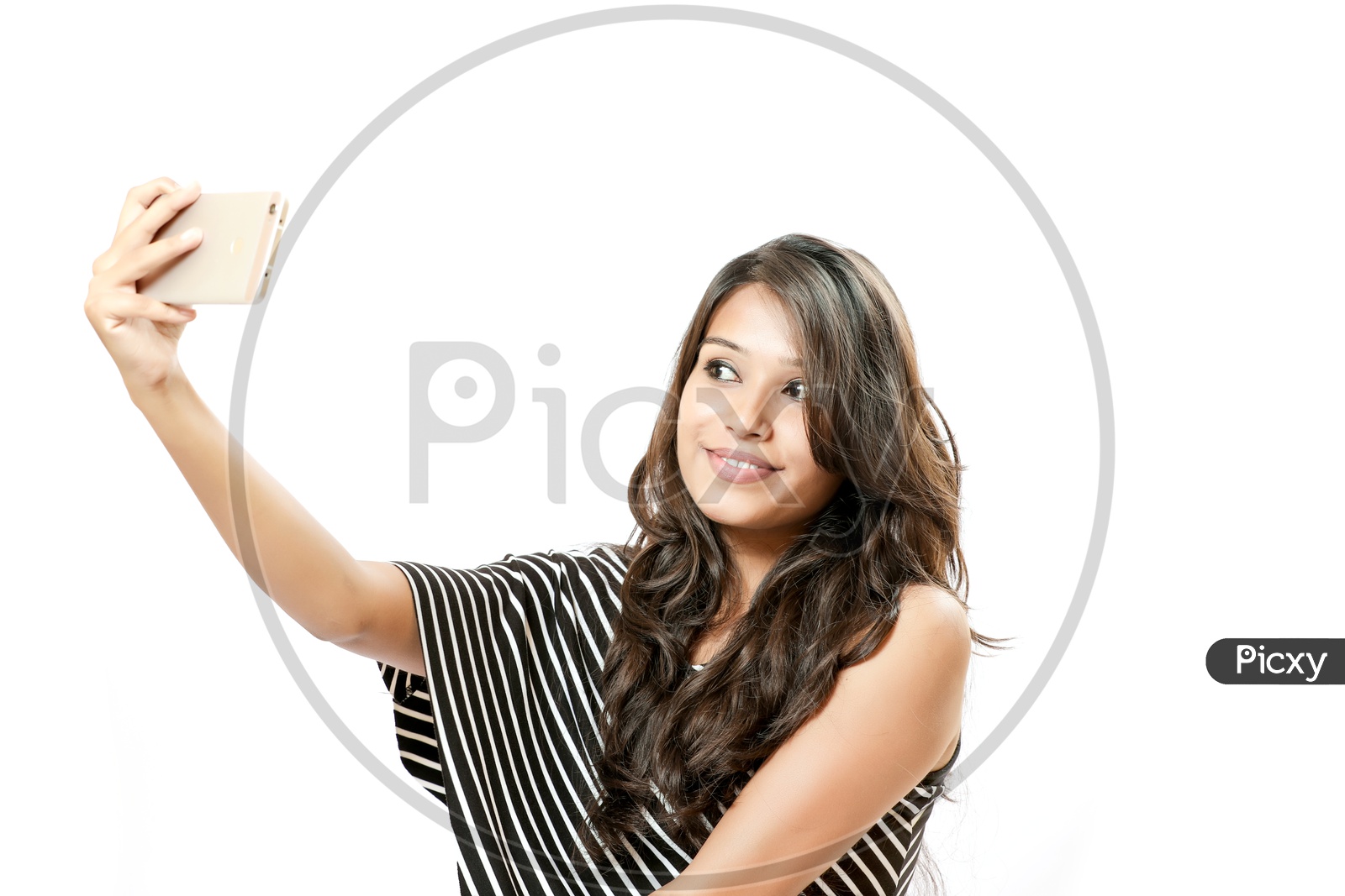 Indian Young Girl Taking a Selfie With a Smiling Face on an Isolated White Background