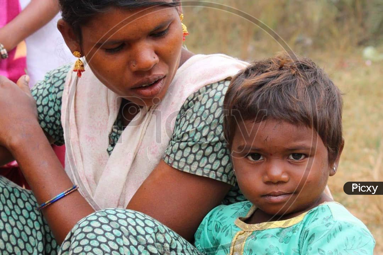 A Mother With Her Child  in Tribal Village Near Hyderabad