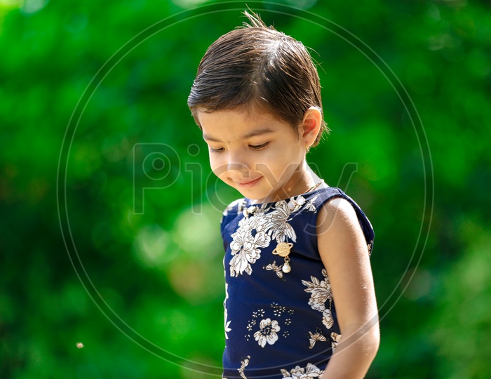 Indian Girl Child Portrait With a Smiling Face