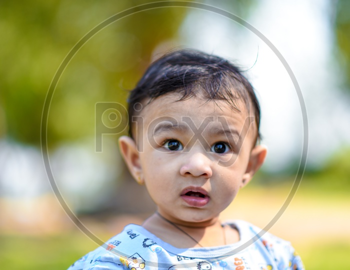 Indian Cute Baby Boy Closeup Shot With Cute Expressions