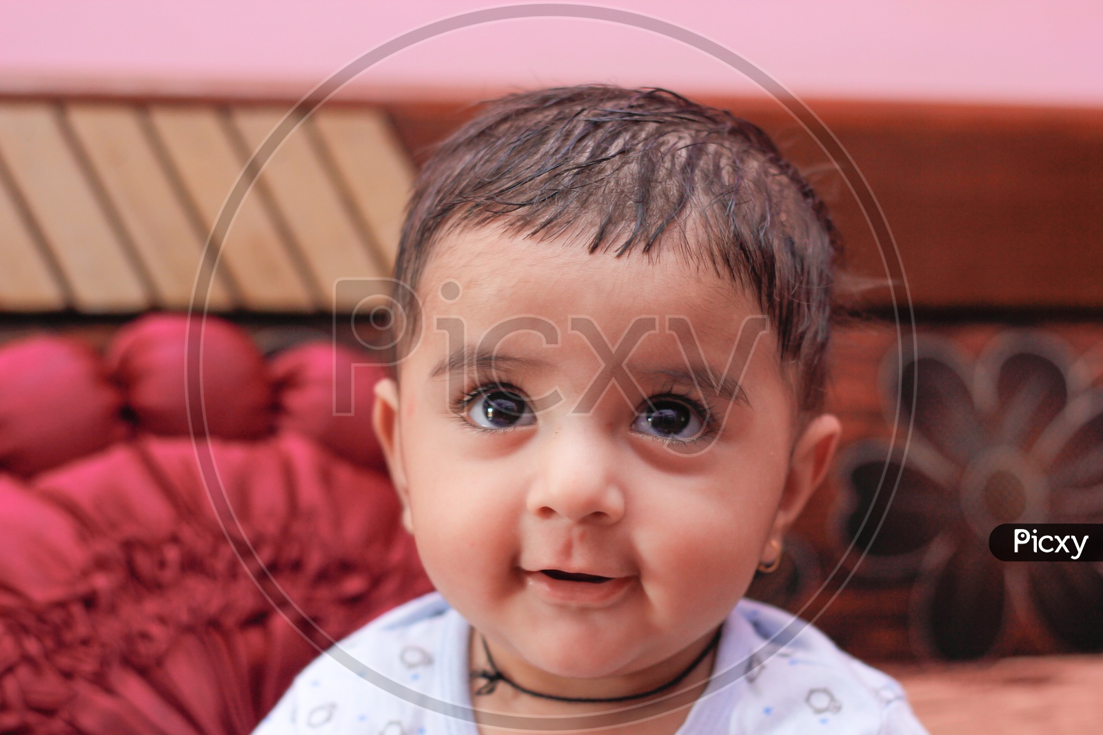 Indian Cute Baby Boy With Smiling Face Closeup Shots