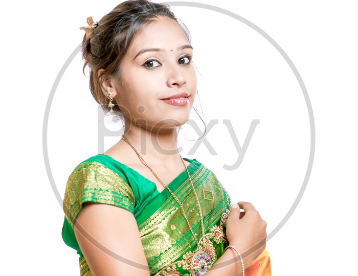 Indian Young Lady Wearing Saree  with a Smiling Face on an Isolated White Background