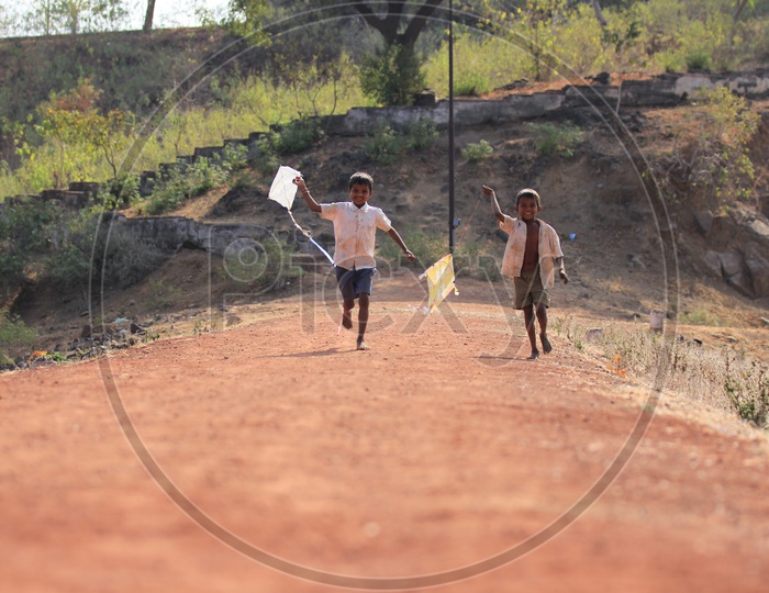 indian village kids playing with kites
