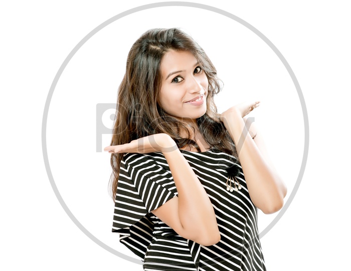 Indian Young Girl With Cute Expressions on an Isolated White Background