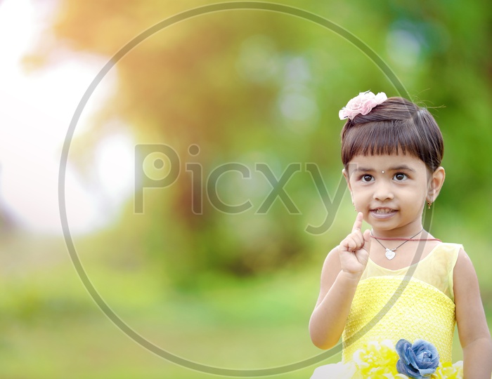 Indian Girl Child With Cute Expressions Closeup Shot