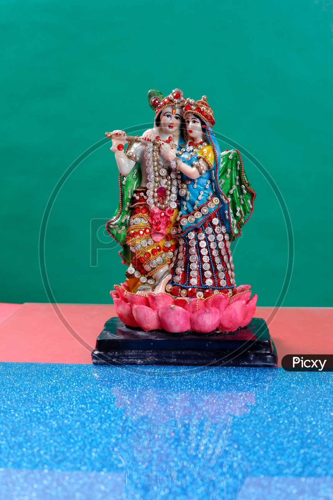 Radha Krishna Idol and beautiful green background / Lord Sri Krishna Idol