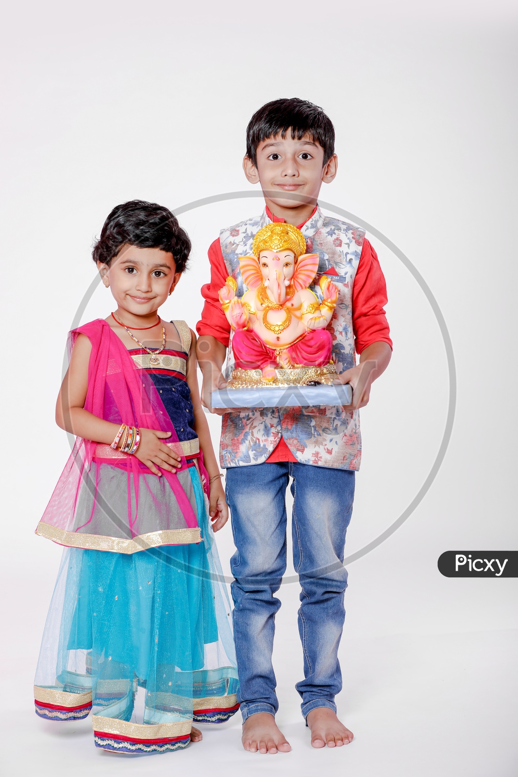 Indian Children with Lord Ganesh Idol