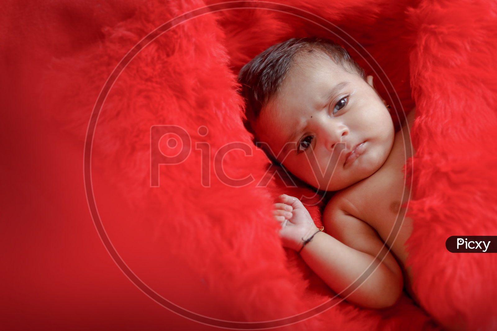 Indian Cute Baby With A Cute  Expression on Face Closeup Shot