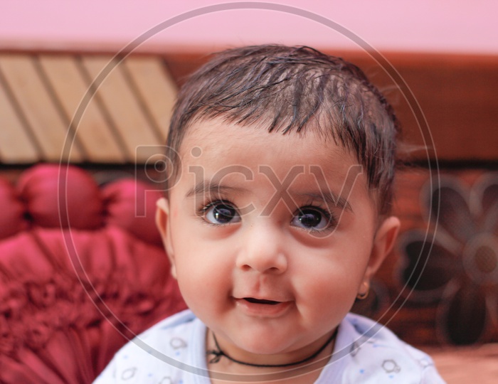 Indian Cute Baby Boy With Smiling Face Closeup Shots