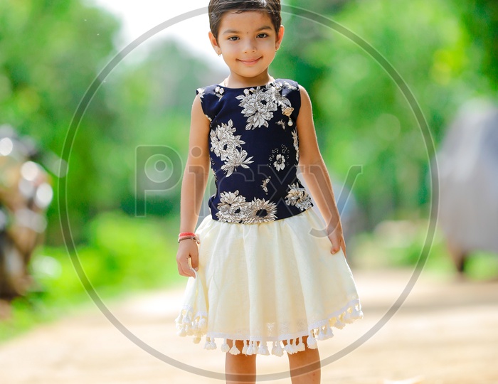 Indian Girl Child Portrait With Smiling Face