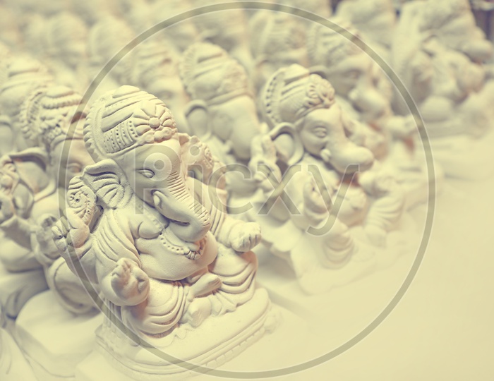 Clay Ganesha Idols placed in a sequence / Lord Ganesh Idol