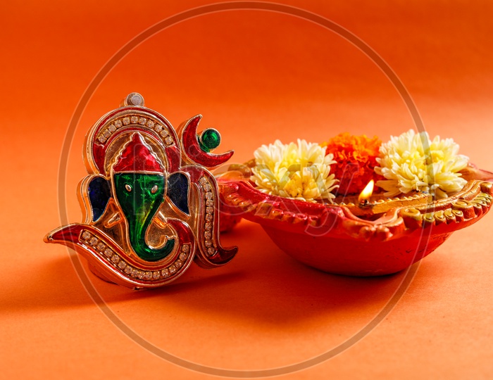 Indian Festival Diwali, Diwali Lamps, Deepavali Diyas with Flowers