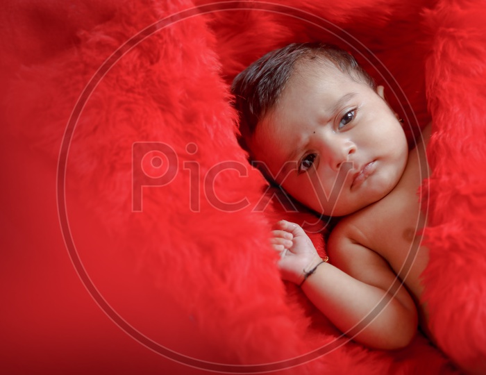Indian Cute Baby With A Cute  Expression on Face Closeup Shot