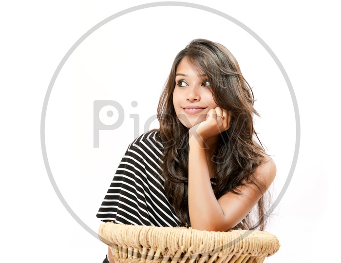 Indian Young Girl With an Expression On Her Face On an Isolated White Background