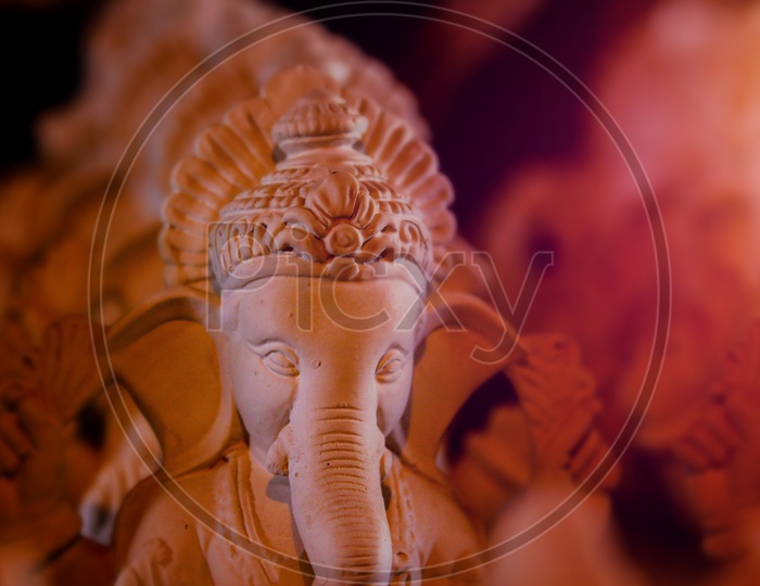 Close up shot of Lord Ganesh Idol / Ganesha Idol  / clay ganesha Idol