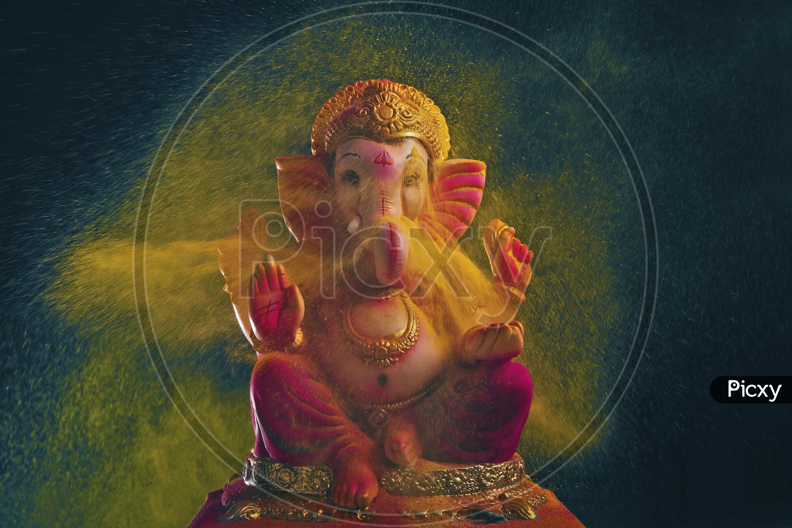 Ganesh Idol with beautiful colour splash in the background