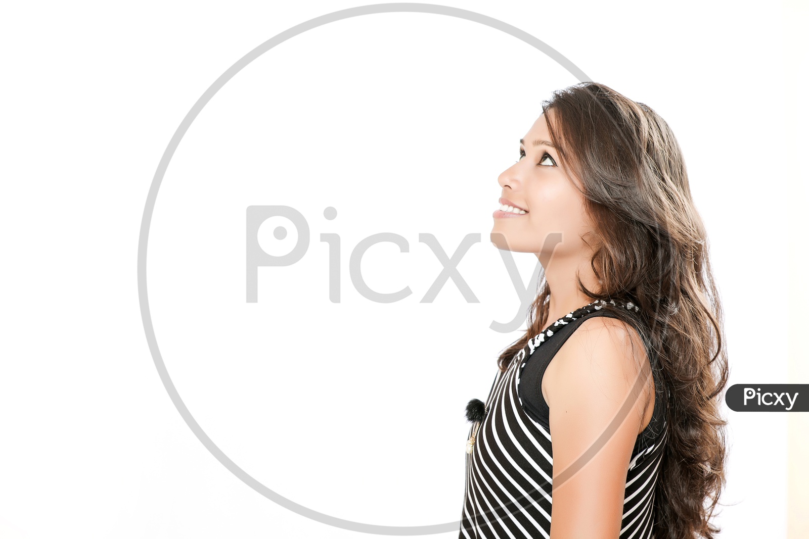 Indian Young Girl With Cute Expressions on an Isolated White Background