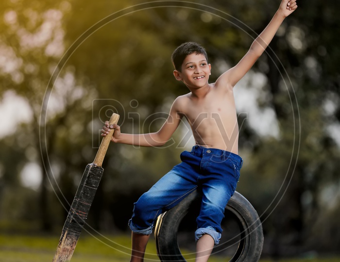 Indian Rural Boy With an Expression On Face and Posing