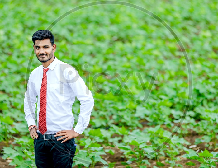 Indian Young Professional In Agricultural Fields with an Expression