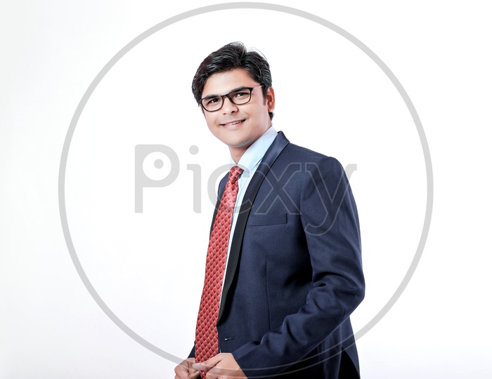 Indian Young Professional Man In Suite with a Smile On Face