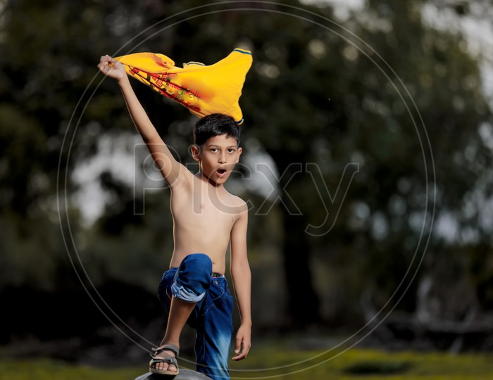 Indian Rural Boy With an Expression On Face and Posing