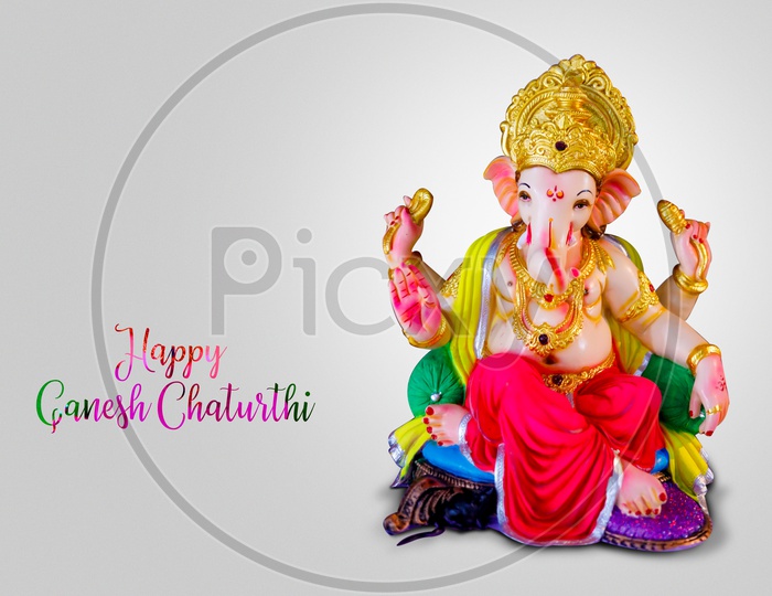 Happy Ganesh Chaturthi Poster with Lord Ganesh Idol and white Background