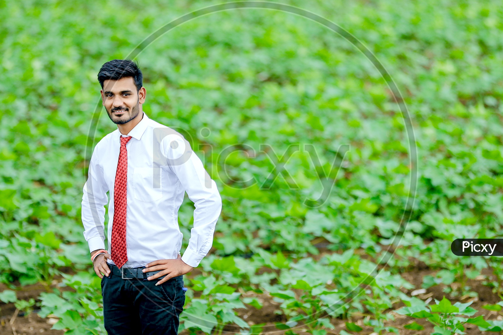 Indian Young Professional In Agricultural Fields with an Expression