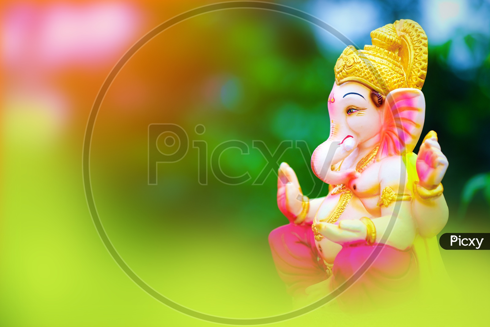 Lord Ganesh Idol with beautiful greenery in the  background