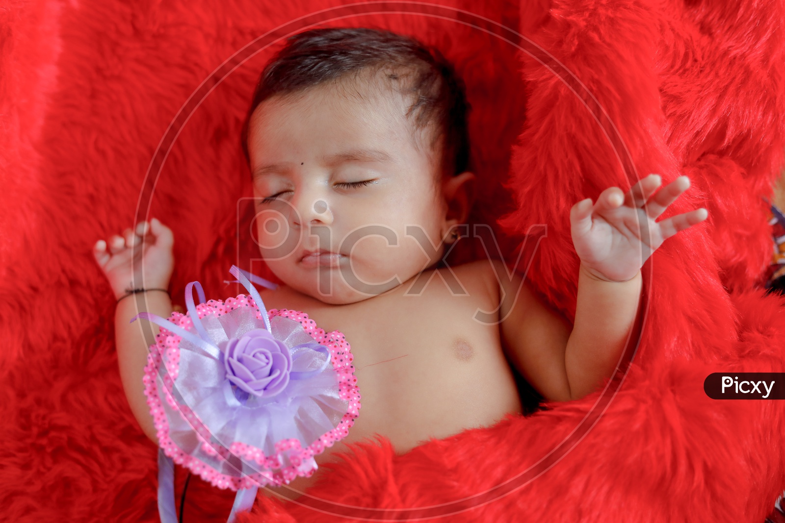 Indian Cute Baby Sleeping With A Cute  Expression on Face Closeup Shot