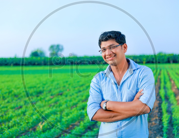 Indian Young Man/Farmer In Agricultural Field