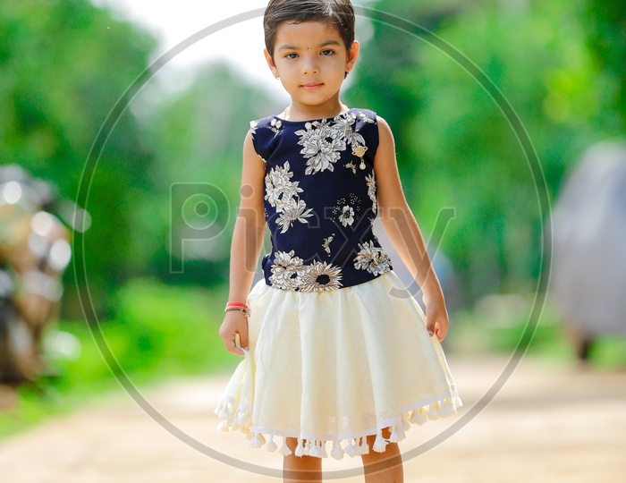 Indian Girl Child Portrait With Smiling Face