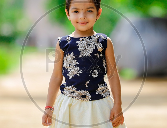 Indian Girl Child Portrait With a Smiling Face