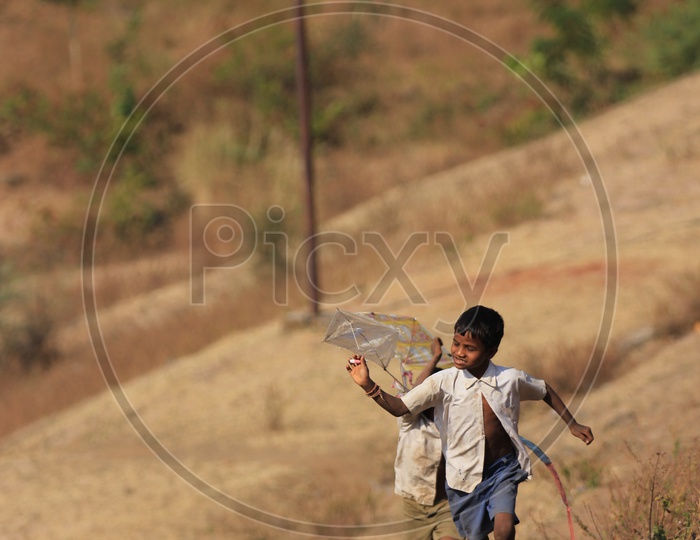 indian village kids playing with kites